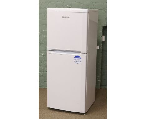 A Beko white enamel fridge freezer.
