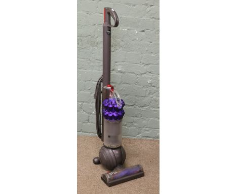 A Dyson DC50 roller ball vacuum cleaner.