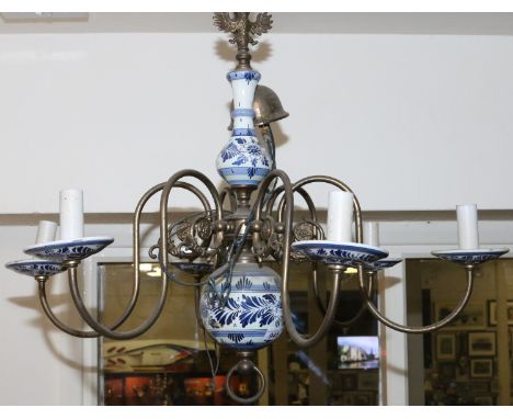 A brass and delft six branch chandelier.