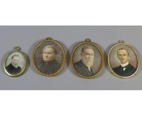 Four over painted photographic portrait miniatures in gilt metal frames.   Condition Report. To be used as a guide only. Good