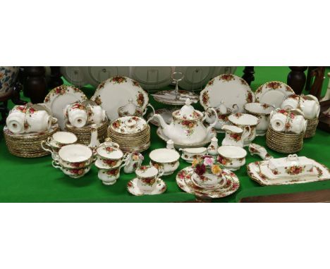 A large quantity of Royal Albert old country roses dinner and teawares to include two teapots, side plates, six bowls, saucer