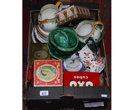 A box of miscellaneous vintage storage tins, Wedgwood jugs, Royal Worcester, Burleigh ware and Majolica cabbage moulded turee