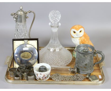 A tray of collectables including a Beswick model of an owl, a glass ships decanter, silver topped cut glass bottle, Grants li