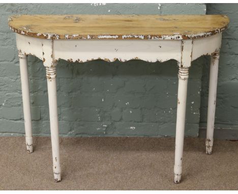 La Maison Chic, French Rococo style oak console table raised on turned supports. Painted in ivory white and distressed.