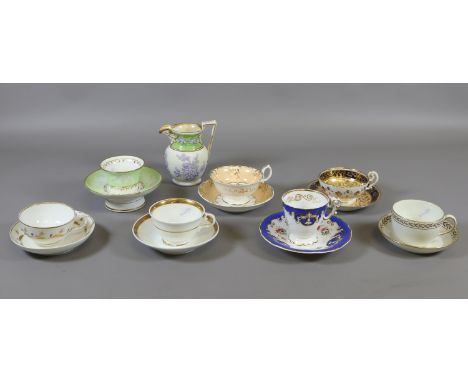 Seven 19th century English porcelain cups and saucers and a lilac moulded jug. Factories include Derby, Coalport, Minton and 