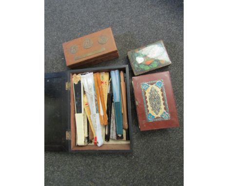 A vintage jewellery with embossed copper plaque to top, mountainous scene with stags, three other boxes 