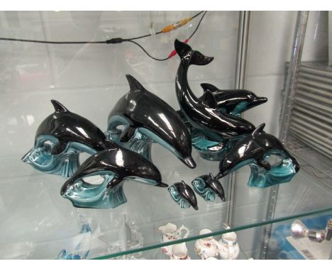 Seven Poole pottery Dolphins