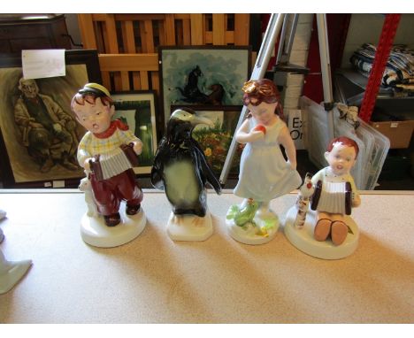 Four Royal Dux figures including Penguin and accordion players