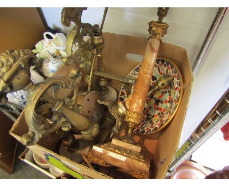 A box containing brass fire dogs, chestnut roaster, lamp bases etc 