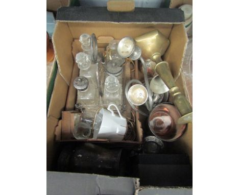 A box of plated items including cruet set, brass candlestick