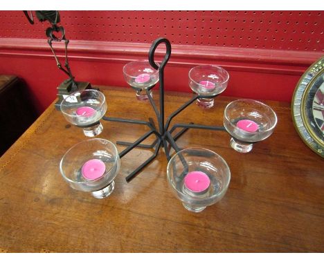 A wrought metal night light six branch table centrepiece