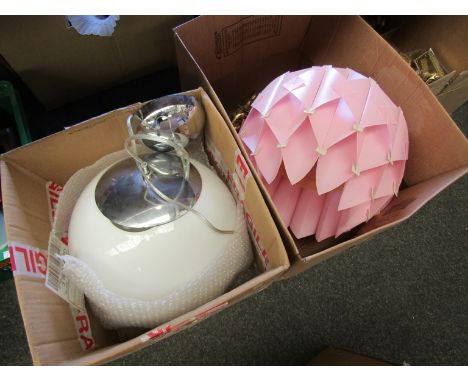 A ceiling light with pink shade and a globular glass example