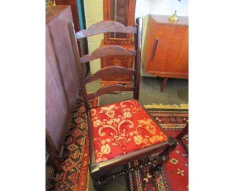 Eight ladder back dining room chairs with red/cream fabric seats