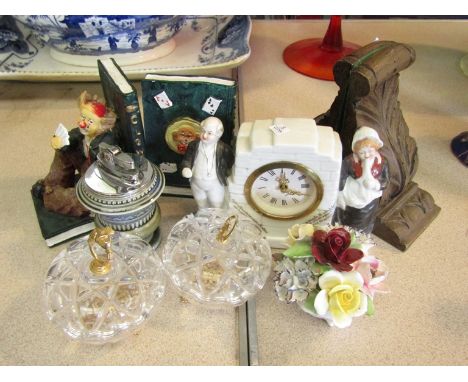 A ceramic Pickwick Papers figural clock holder, pair of glass dressing table pots, floral posy, Irish ceramic table lighter a