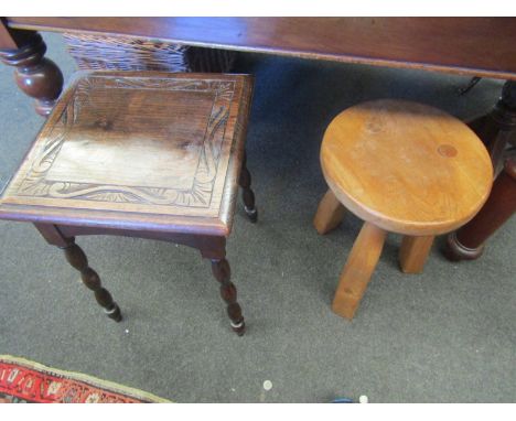 A carved light oak stool and dark oak square top coffee table (2) 