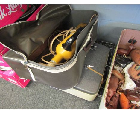 A vintage cased Olympia Monica typewriter, with a bygone Hoover hand held electric vacuum cleaner (2) 