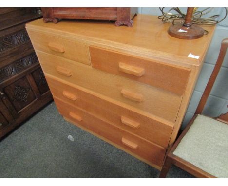 A mid 20th Century light oak utility chest of two over three drawers, 95cm tall x 105cm wide x 48cm deep     