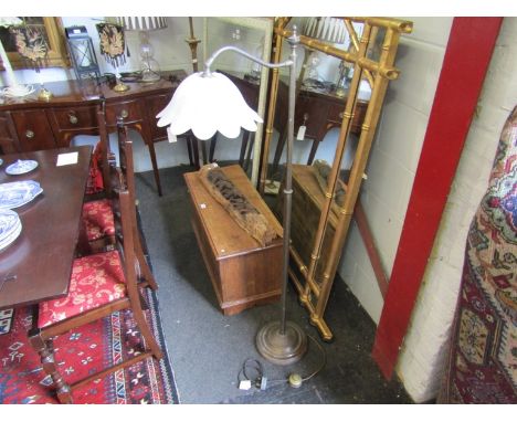 A 19th Century standard lamp with curved arm and floral shade