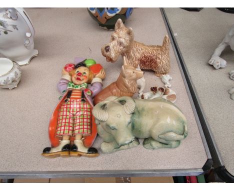 Sylvac and Beswick dog figures, clown and Chinese buffalo (8)