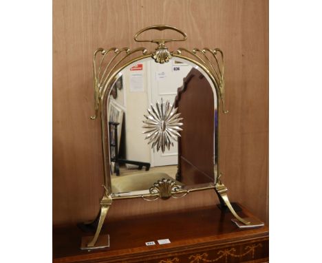 A Victorian brass framed mirrored fire screen H.74cm