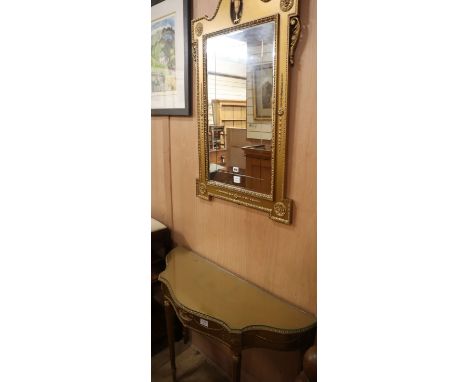 A Victorian gilt framed wall mirror, with a serpentine fronted console table (2) Mirror 104cm high