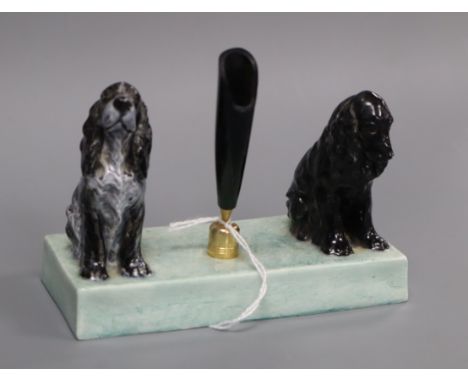 Doris Lindner for Royal Worcester 'Cocker Spaniel' pen holder dated 1937, the two dogs seated either end of a rectangular pli