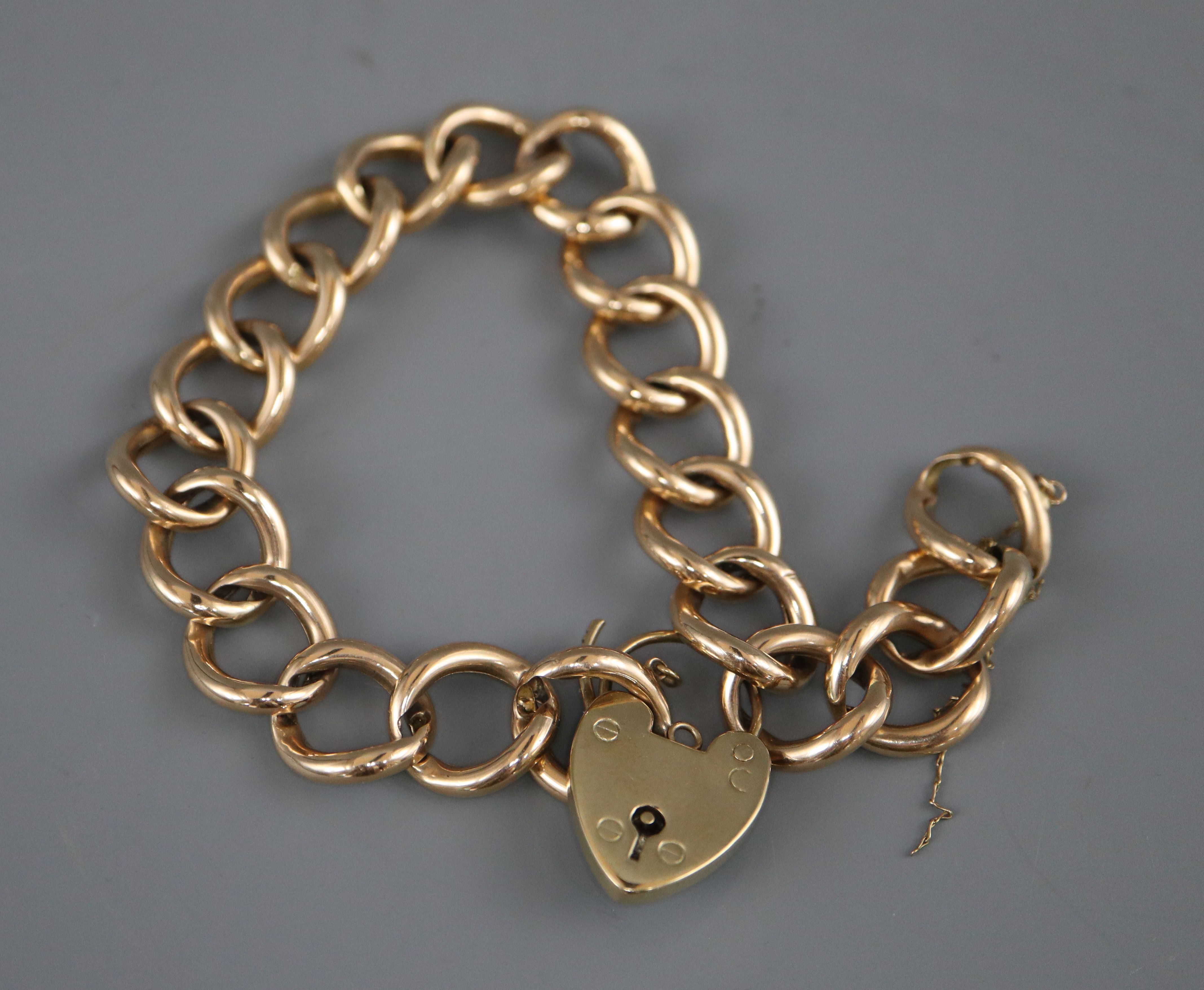 A 9ct gold chain link bracelet with padlock clasp, 19.2g. A 9ct gold chain link bracelet with padlock clasp, 19.2g.
