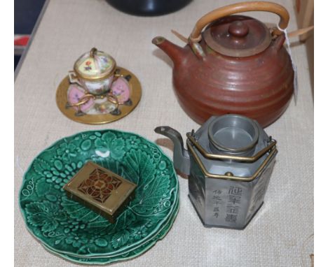 A pottery teapot, three green leaf plates, an ink stand, etc.