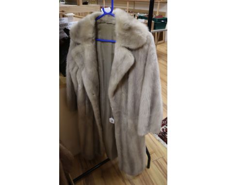 A light grey blonde mink full length coat