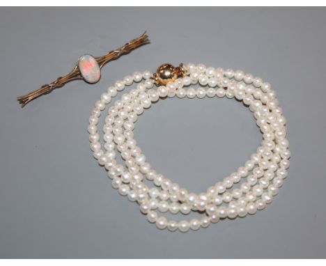 A 15ct and opal bar brooch and a two-row uniform pearl necklace with 14k ball clasp.