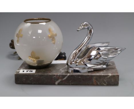 An Art Deco model of a chrome swan lamp on marble stand length 22cm