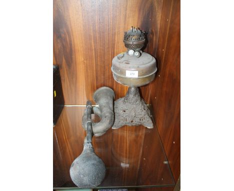 A VINTAGE CAST OIL LAMP WITH TWO DUPLEX BURNER TOGETHER WITH A VINTAGE BLOW HORN A/F