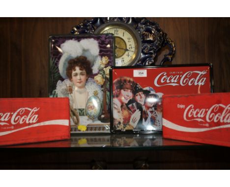 TWO MODERN ENAMEL COCA COLA ADVERTISEMENT SIGNS TOGETHER WITH TWO WOODEN CARRIERS 