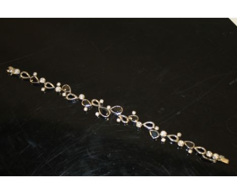 A BOXED SILVER AND SAPPHIRE BRACELET