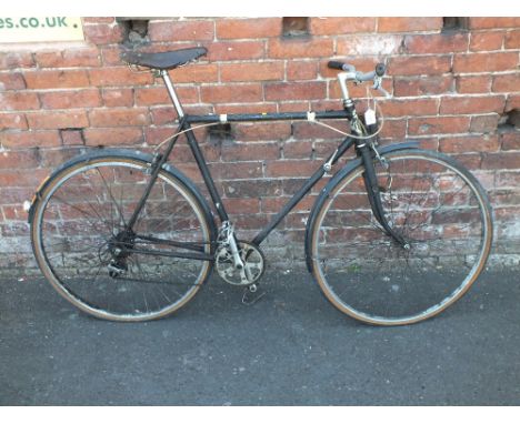 A BLACK VINTAGE TRIUMPH BICYCLE WITH LYCETT LEATHER SADDLE A/F