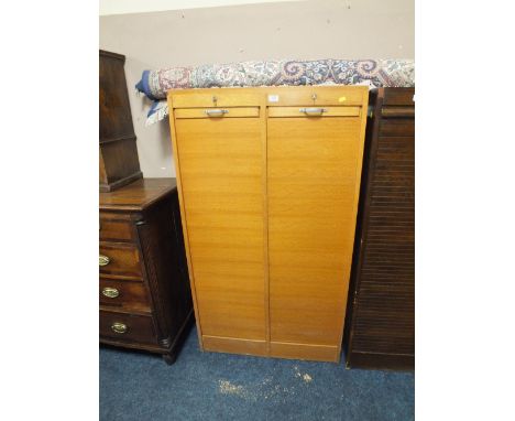 A LIGHT OAK TAMBOUR FRONTED DOUBLE CABINET, W 82 CM