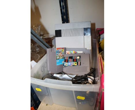 A VINTAGE NINTENDO ENTERTAINMENT SYSTEM GAMES CONSOLE AND GAMES