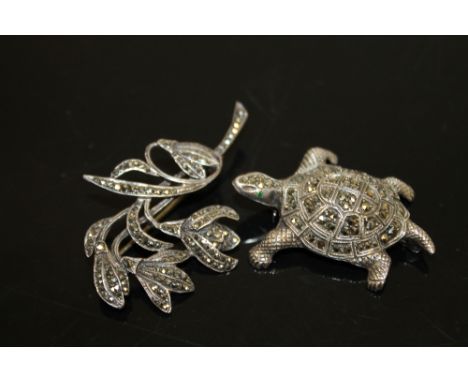 A WHITE METAL MARCASITE SET TORTOISE BROOCH TOGETHER WITH ANOTHER STAMPED SILVER (2) 