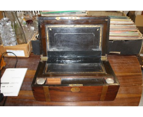 A VINTAGE ROSEWOOD BRASS BANDED WRITING SLOPE