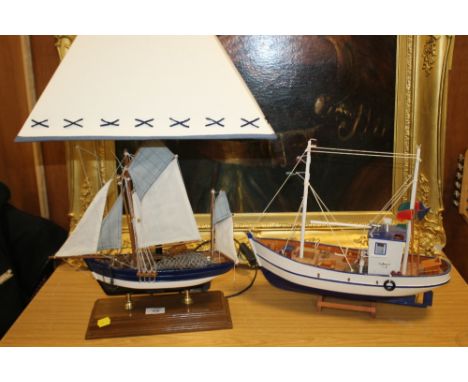 A MODERN WOODEN FISHING BOAT LAMP TOGETHER WITH ANOTHER