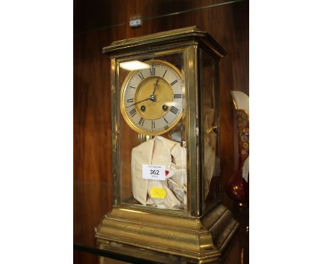 A VINTAGE BRASS AND GLASS MANTLE CLOCK AF