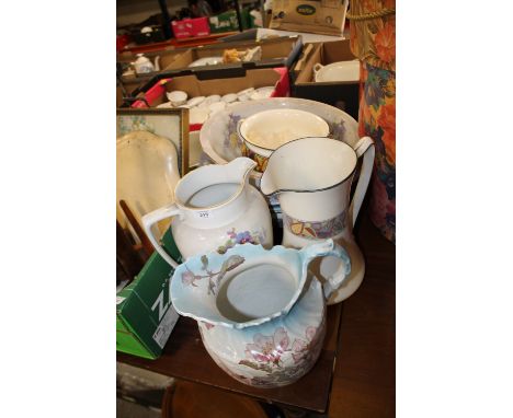 A QUANTITY OF LARGE CERAMIC WATER JUGS AND BOWLS ETC. 