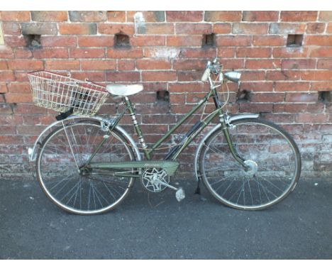 A VINTAGE RALEIGH RIVIERA BICYCLE