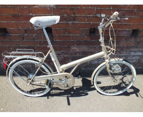 A VINTAGE RALEIGH 20 SHOPPER CIRCA 1982 IN METALLIC GOLD WITH WHITE WALL TYRES