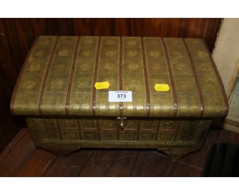 A VINTAGE EASTERN BRASS COATED TABLE TOP SCROLL BOX 
