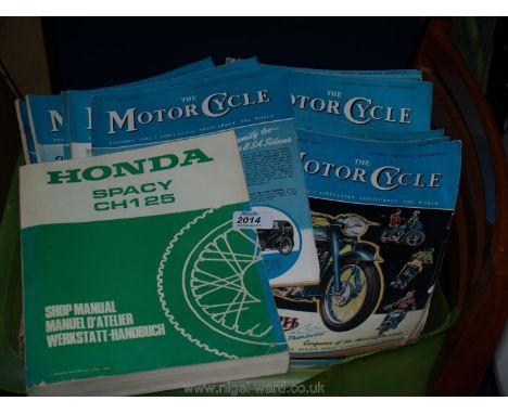 A large quantity of The Motorcycle Magazine along with a Honda Shop manual