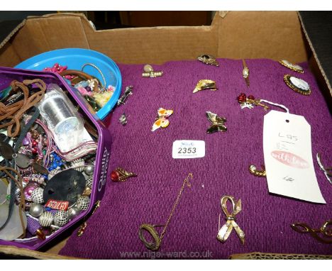 Two tubs of costume jewellery plus cushion with costume brooches attached