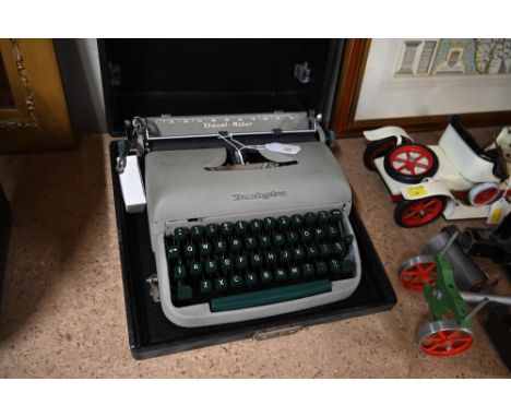 A vintage cased Remington typewriter 