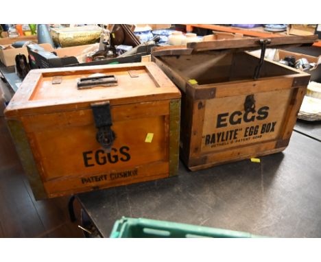 Two vintage wooden egg crates with carrying handles 