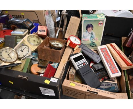 Two boxes of vintage Smiths and other clocks, a magnifier and a boxed zoom microscope 